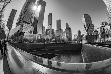 Photo for NEW YORK, USA - MARCH 9, 2020: Large angle view of Memorial of 11 September 2001, located in WTC Memorial Plaza, Manhattan. - Royalty Free Image