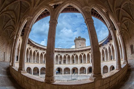 Photo for Inner yard of the Circular Gothic Bellver Castle (Castillo de Bellver) built by architect Pere Salva in 1300-1311 for King James II of Aragon and Majorca. Palma de Mallorca, Balearic islands, Spain. - Royalty Free Image