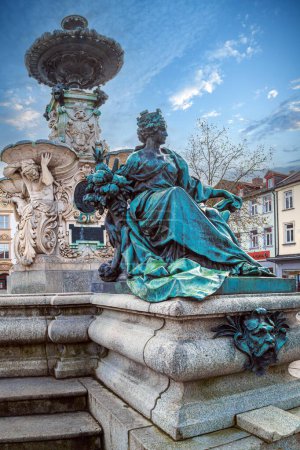 Photo for ERLANGEN, GERMANY - DEC. 16, 2023: Detail of the Pauli Fountain (Paulibrunnen). Was donated by the merchant couple Pauli since 1889. Designed in the style of the Neo-Renaissance by Friedrich Wanderer. - Royalty Free Image
