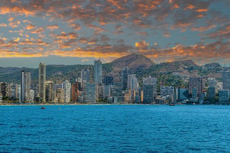 Photo for BENIDORM, SPAIN - AUGUST 16, 2020: View of skyscrapers of the city from the Mediterranean sea. The city is considered Manhattan of Spain. - Royalty Free Image