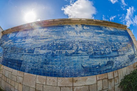 Photo for Mirador de Santa Lucia, Alfama district, Lisbon, Portugal. Tile Azulejos panel depicting a drawing of the Praa do Comrcio as it was in 1718, before it was destroyed in the earthquake of 1755. - Royalty Free Image
