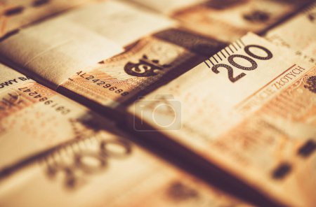 Photo for Detailed Closeup of Two Hundred Polish Zloty Bills Arranged in a Bundle. Business and Financial Theme. - Royalty Free Image