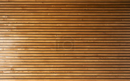 Photo for Modern Stylish Lamellas Wooden Wall. Architectural Material. - Royalty Free Image