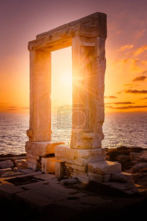 Photo for Portara at sunset, ruins of Apollo temple on Naxos island, Cyclades archipelago, Greece - Royalty Free Image