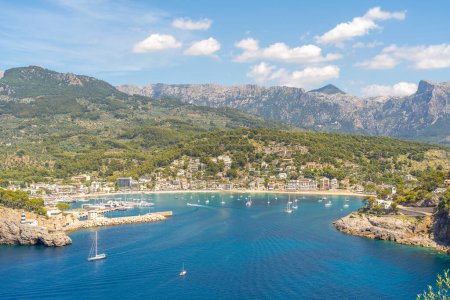 Photo for Port de Soller: a stunning snapshot where the UNESCO-protected Tramuntana Mountains meet the tranquil, azure waters of Mallorca's west coast. - Royalty Free Image