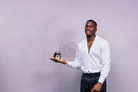 African American millennial businessman isolated on a studio background, successful male formal suit