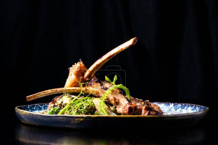 Grilled foods - rack of a lamb with parsley, white radish and grocery