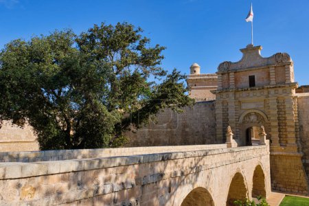 Photo for Mdina Gate, also known as the Main Gate or the Vilhena Gate, of the fortified city was built in the Baroque style in 1724 - Mdina, Malta - Royalty Free Image