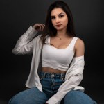 Young and beautiful teenage girl in denim jeans 