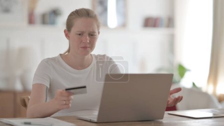 Photo for Young Woman Having Fail Online Payment on Laptop - Royalty Free Image
