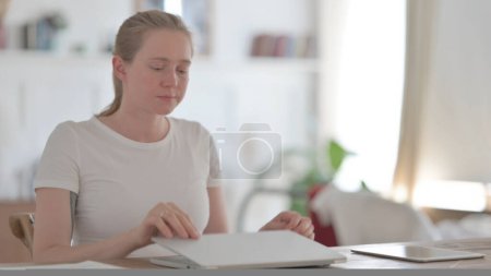Photo for Young Woman Closing Laptop Standing Up, Going Away - Royalty Free Image