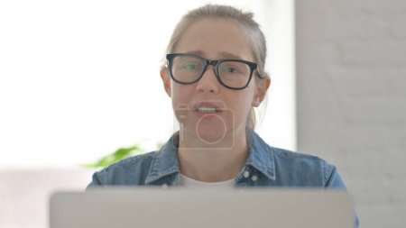 Photo for Close up of Rejecting Beautiful Woman in Denial while using Laptop - Royalty Free Image