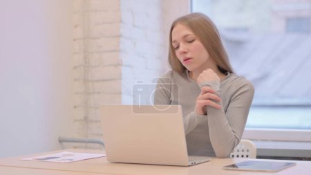 Photo for Creative Young Woman with Wrist Pain at Work - Royalty Free Image