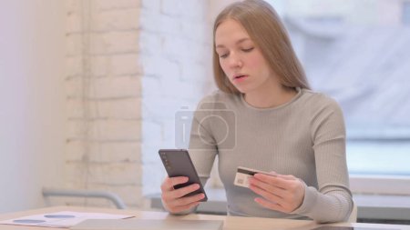 Photo for Creative Young Woman Unable to make Online Payment with Credit Card - Royalty Free Image