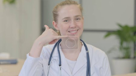 Photo for Call me Gesture by Female Doctor for Consulting - Royalty Free Image