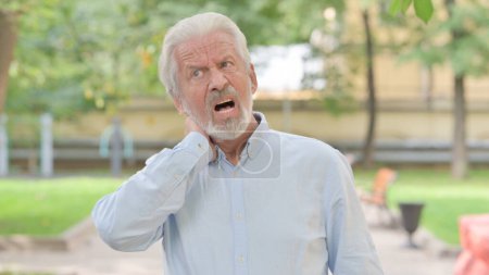 Photo for Outdoor Portrait of Senior Old Man with Neck Muscle Pain - Royalty Free Image