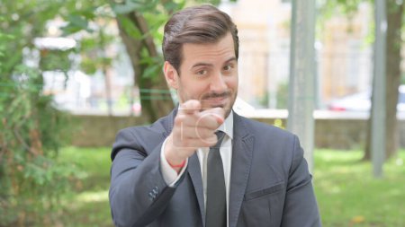 Photo for Outdoor Portrait of Excited Young Businessman Clapping for Team - Royalty Free Image