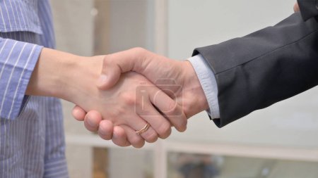 Photo for Close Up of Hand Shake by Business People - Royalty Free Image