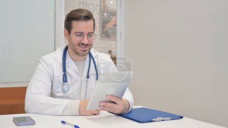 Photo for Middle Aged Doctor Talking on phone with Patient - Royalty Free Image