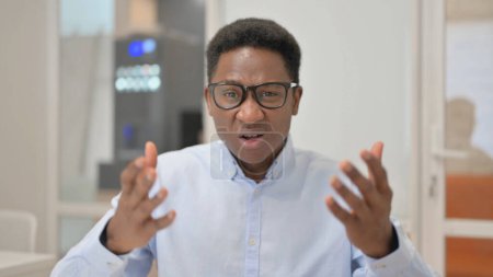 Photo for Portrait of African Businessman Reacting to Failure in Office - Royalty Free Image