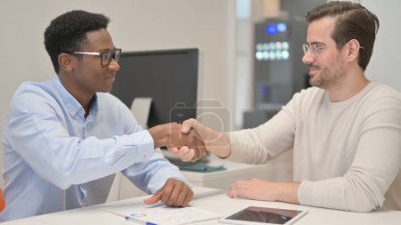 Photo for Business People Shaking Hand in Office - Royalty Free Image