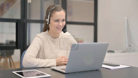 Photo for Mature Woman with Headset Talking with Customer - Royalty Free Image