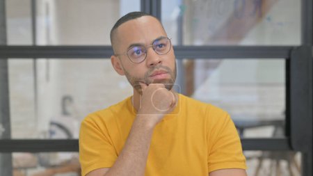 Photo for Portrait of Pensive Mixed Race Man Thinking New Idea - Royalty Free Image