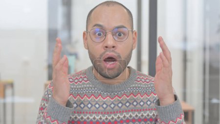 Photo for Portrait of Mixed Race Man Reacting to Failure - Royalty Free Image