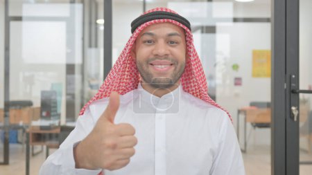 Photo for Portrait of Young Muslim Man with Thumbs Up - Royalty Free Image