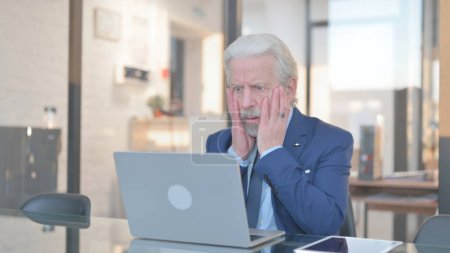 Photo for Old Businessman Shocked by Loss on Laptop - Royalty Free Image