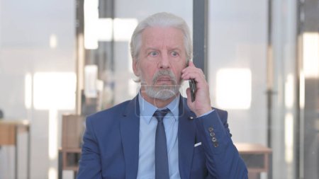 Photo for Portrait of Senior Old Businessman Talking on phone - Royalty Free Image