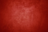 Beautiful red background with leather texture with red veins of red leather background as sample of red background from natural leather or sample of texture of leather for beautiful natural background Poster #620112418