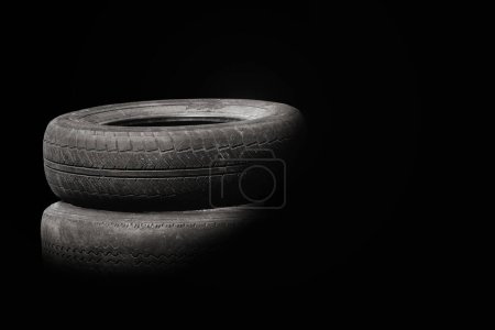old worn damaged tires isolated as pattern of damaged tire for advertising tire shop or car tire shop