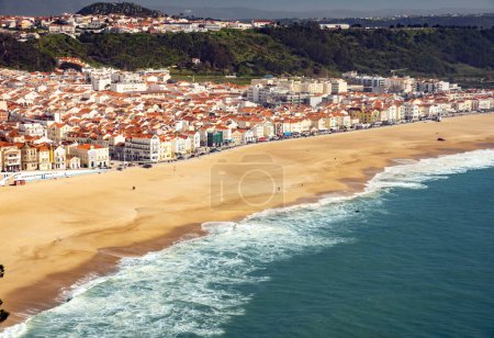 Photo for High point view of Nazare. Sand beach, sea, village Nazare, Portugal. - Royalty Free Image