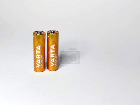 Photo for Varna, Bulgaria - March, 11, 2023: two Varta batteries on a white background, copy space - Royalty Free Image