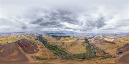 Photo for Panorama 360 birds eye view of the Aksu river in the Aksujabagly nature reserve, in cloudy weather in summer. Gorgeous rural landscape with wheat fields - Royalty Free Image