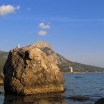 Natural summer landscape, rock in sea with seagull.