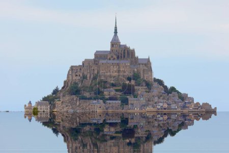 Photo for Famous abbey of mont saint michel in the north of france at high tide - Royalty Free Image