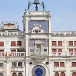 Ancient astronomical clock tower with statues called Mori di Venezia in Venice in Italy without people during lockdown in Italy