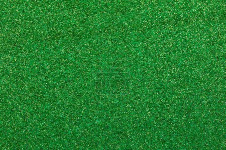 Photo for Wide shimmering GREEN glitter material background with sparkles ideal as a lawn backdrop - Royalty Free Image