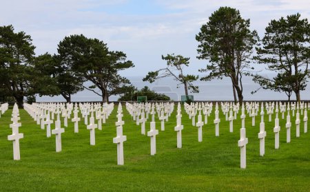 Photo for Colleville-sur-Mer, FRA, France - August 21, 2022: American Military Cemetery and many crosses on the graves of the soldiers - Royalty Free Image