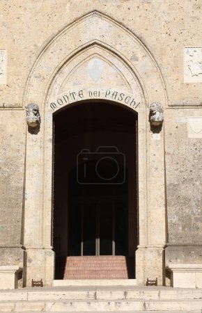Photo for Siena, SI, Italy - February 20, 2023: Door of Headquarters of the Italian bank called MONTE DEI PASCHI DI SIENA - Royalty Free Image