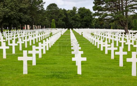 Photo for Colleville-sur-Mer, FRA, France - August 21, 2022: American Military Cemetery and many crosses on the graves of the soldiers - Royalty Free Image