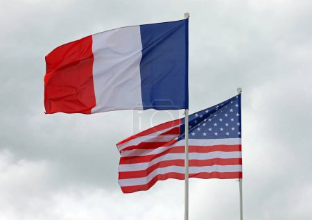 Photo for Flags of France and USA waving together the symbol of Cooperation and Solidarity - Royalty Free Image