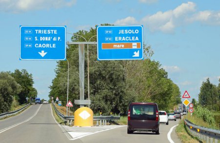 Photo for Crossroad and name of italian place and text MARE that means SEE in italy with cars - Royalty Free Image