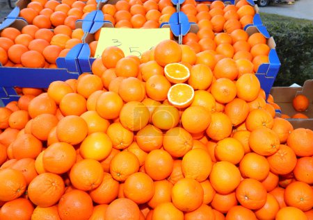 Photo for Stall with ripe orange oranges for sale at the greengrocer - Royalty Free Image