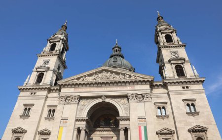 Photo for St Stephen s Basilica in BUDAPEST in Hungary in central Europe and flags - Royalty Free Image