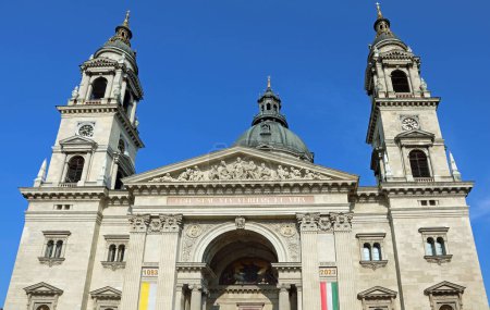 Photo for Budapest, B, Hungary - August 18, 2023: St Stephen s Basilica and flags - Royalty Free Image