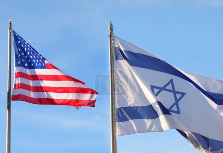 two large Israeli and American flags waving in the sky without people