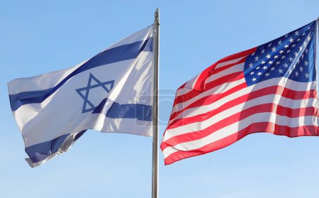 Photo for Two Israeli and American flags flying in the sky without people - Royalty Free Image